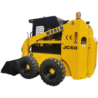 Ładowarka burtowa 4WD Kubota w kolorze żółtym z przystawką wielofunkcyjną